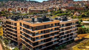 Un centenar de pisos de disseny estrenen el ‘boom’ del barri més petit de Barcelona